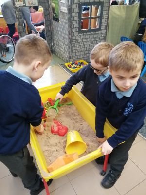 The boys are building 'sand houses'