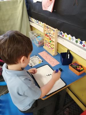 Rhys has been practising his letter formation
