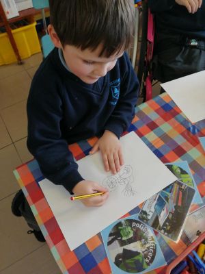 Rhys is drawing the police motorcycle